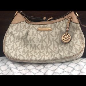 Cream colored Michael Kors purse NEVER USED